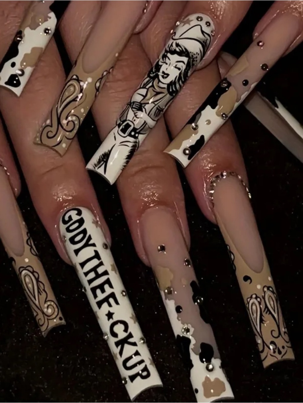 Cowgirl Graphic Long Stiletto Press-On Nails — Nude, White & Black Cow Print